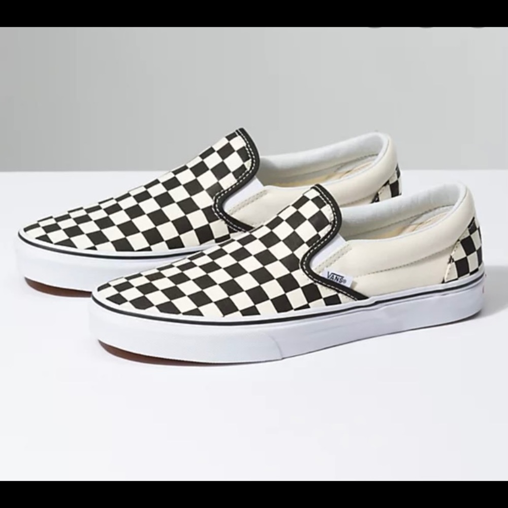 Checkered Vans slip-ons